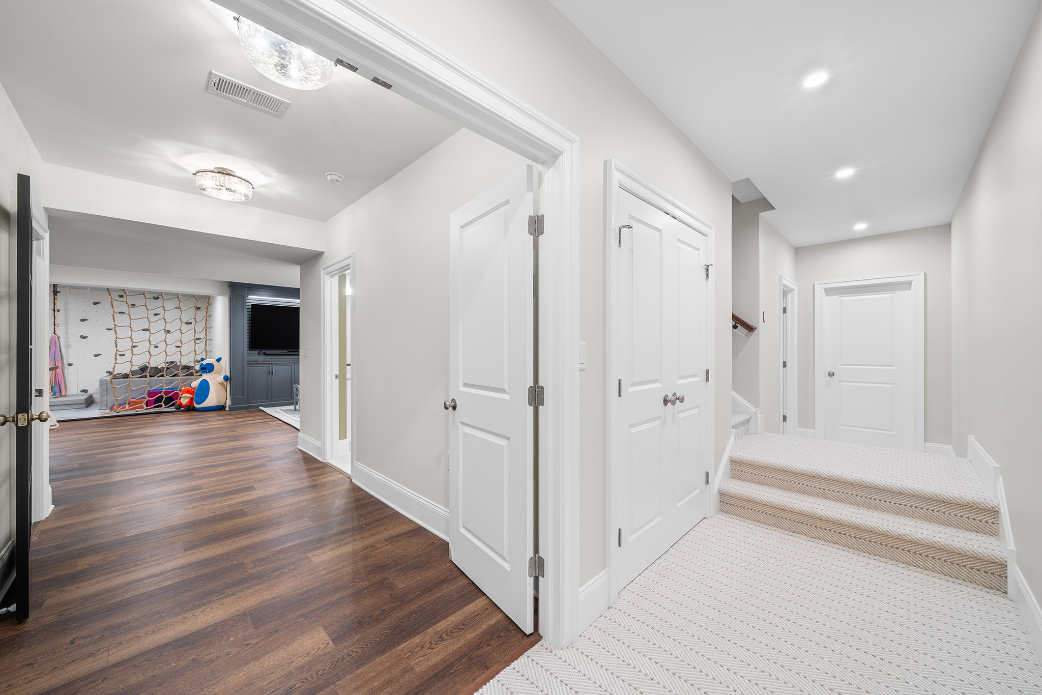 Domers Construction - Integrated and transformed unfinished garage and basement into indoor play area, mudroom, home gym, home brew bar, office, bathroom and bedroom